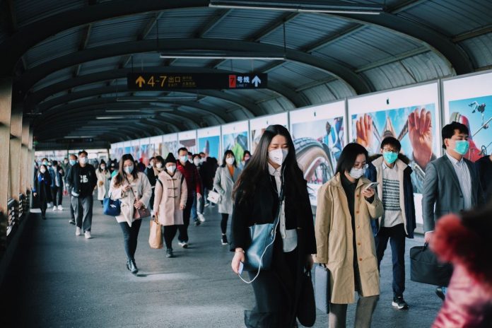 china-people-with-masks-train-station-3960136