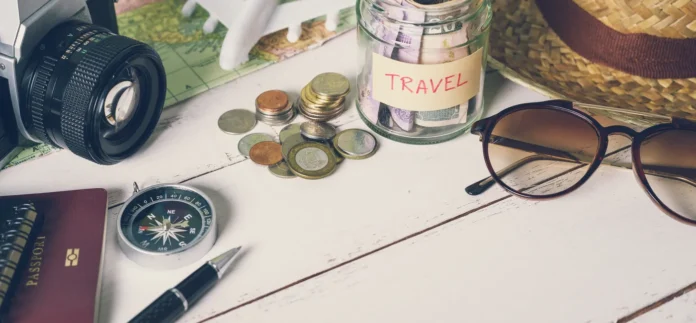 Saving-money-for-travel-696x323